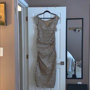 Taupe evening gown with gold crystal beads